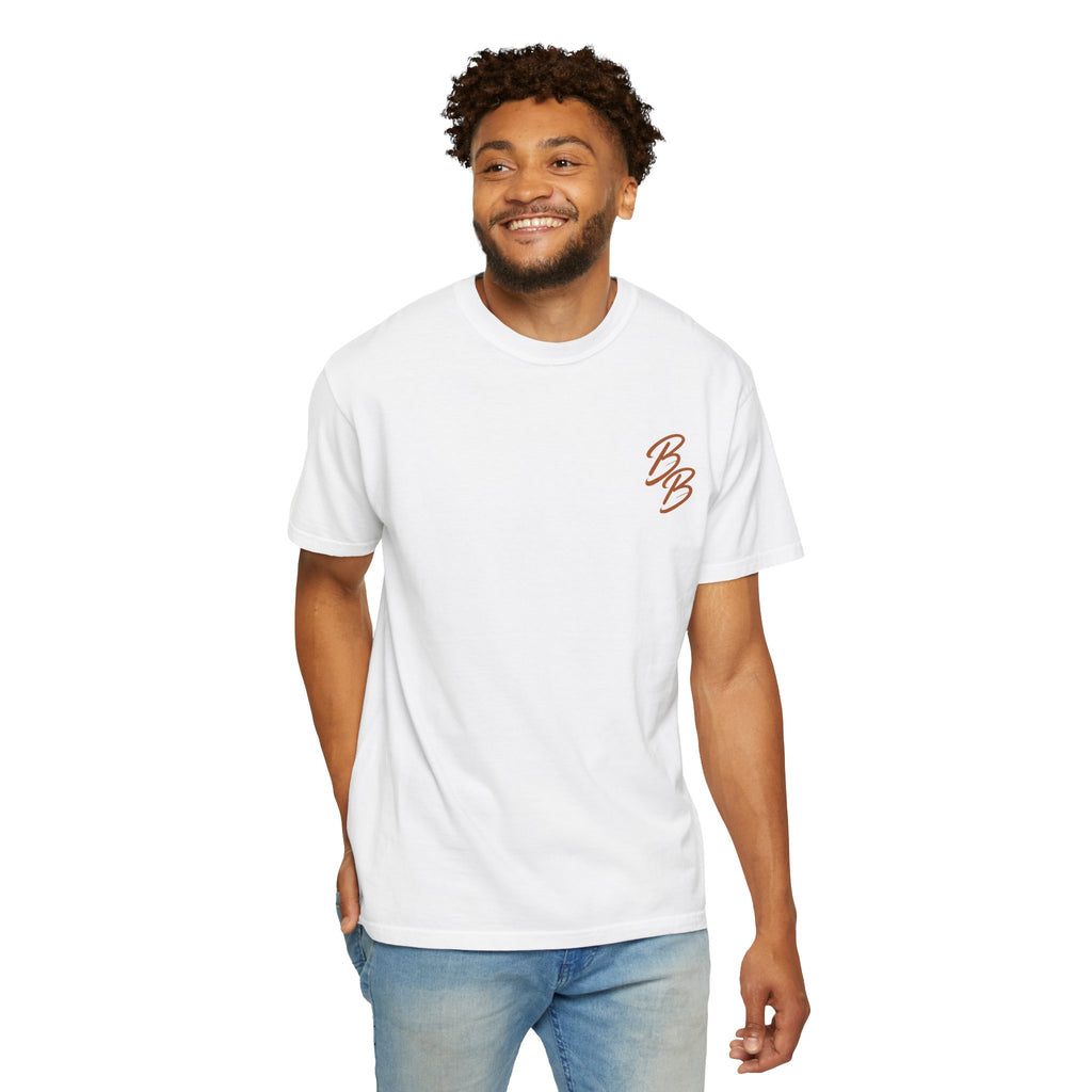 White T-shirt with orange script logo on left chest, worn by model