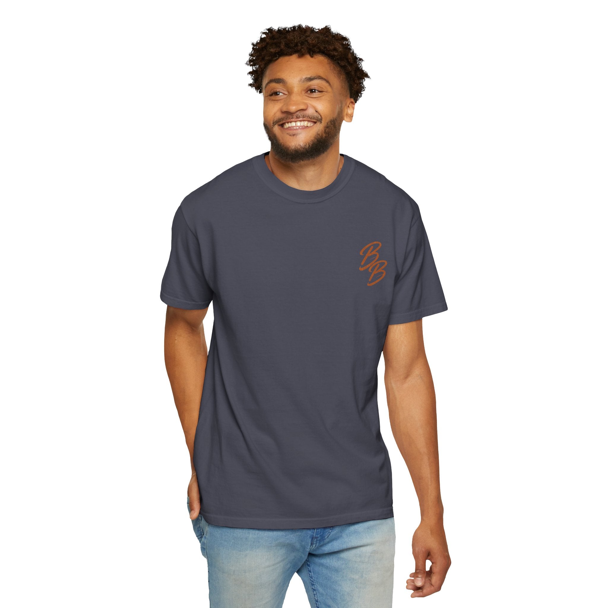 Charcoal blue T-shirt with orange script logo on left chest, worn by model