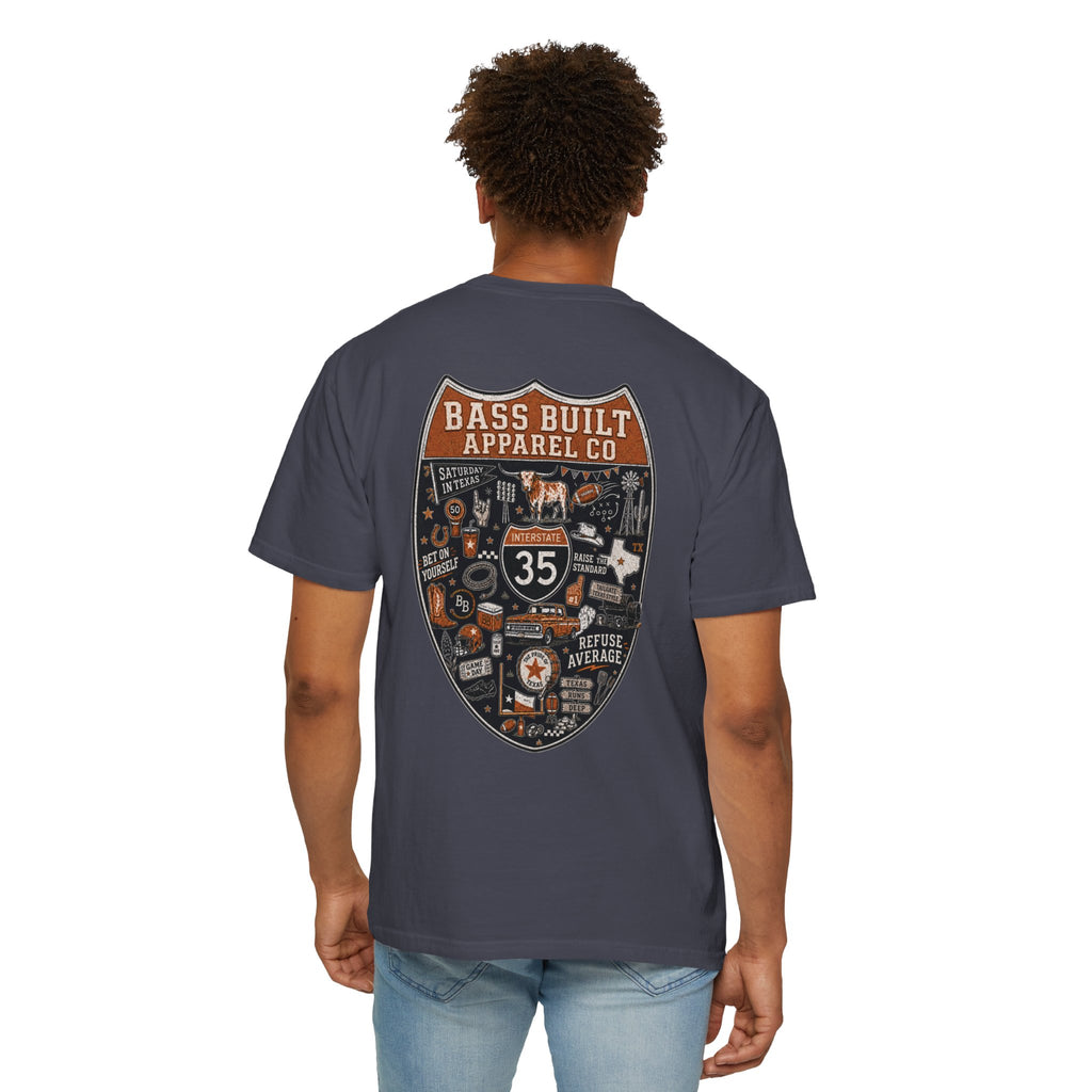 Navy gray crew neck T-shirt with large shield graphic on back, worn by model